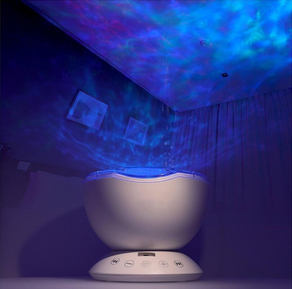 Ocean wave projector with sounds and speaker. | Projectors